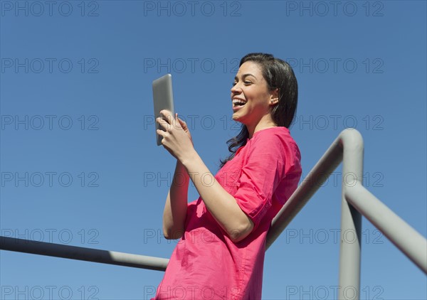 Young woman using tablet pc.