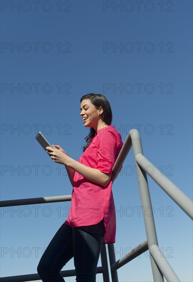 Young woman using tablet pc.