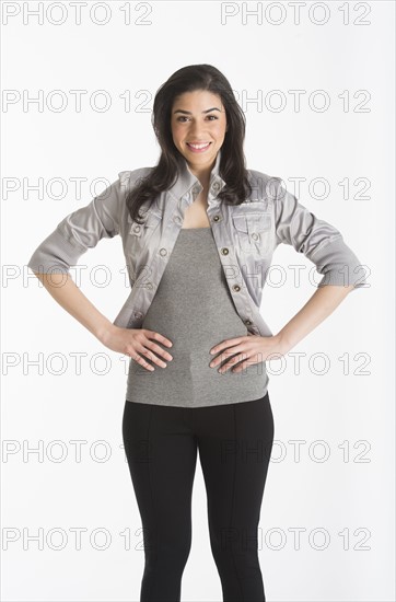 Studio portrait of young woman.