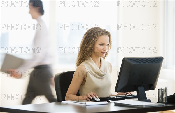 Business woman working in office.
