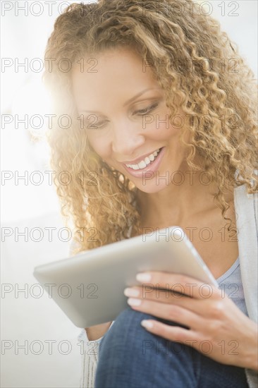 Woman looking at tablet pc.