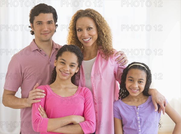 Portrait of parents with daughters (10-13).