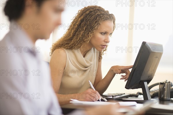 Business woman working in office.