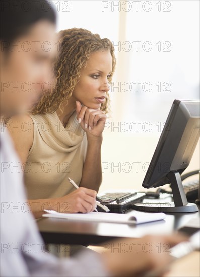 Business woman working in office.