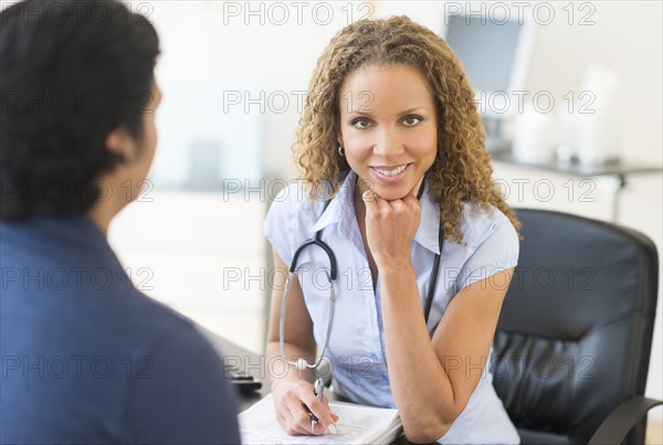 Doctor and patient in clinic.