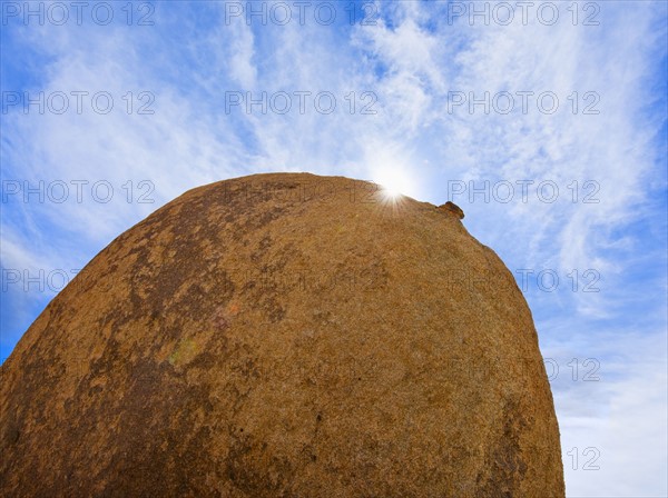 USA, California, Joshua Tree National Park, Boulder with sunny sky.