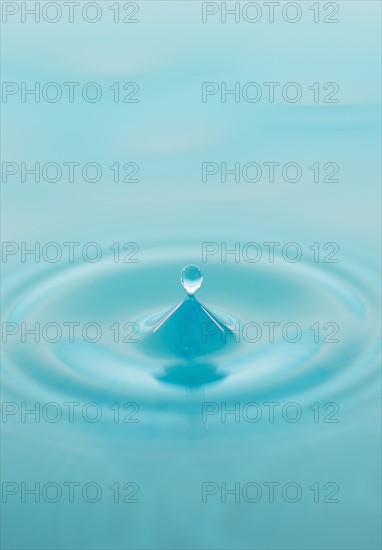 Drop falling into water.