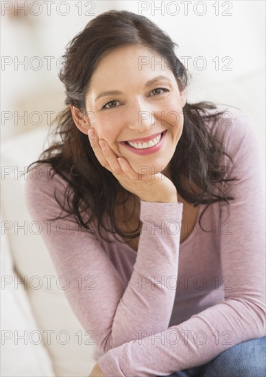 Portrait of smiling woman.