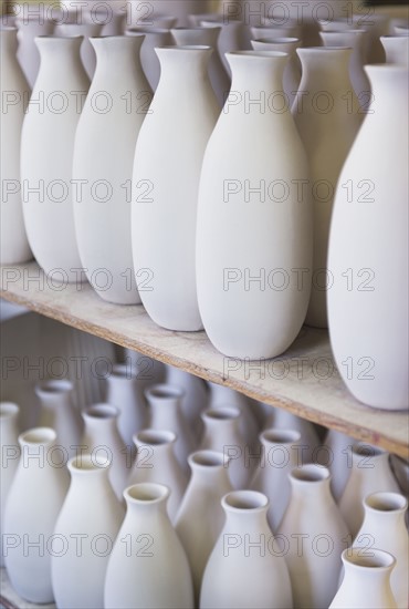 USA, New Jersey, Jersey City, Pottery on shelves.