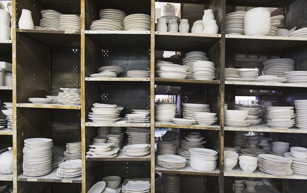 USA, New Jersey, Jersey City, Pottery on shelves.