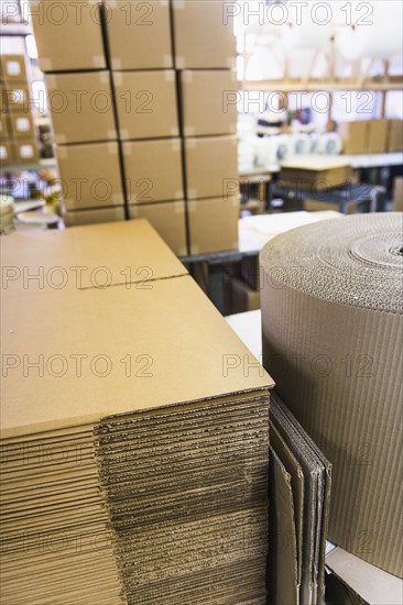 Cardboard for boxes in warehouse.