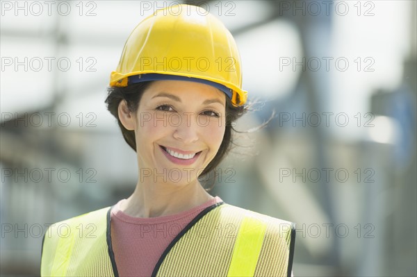 Portrait of female construction worker.