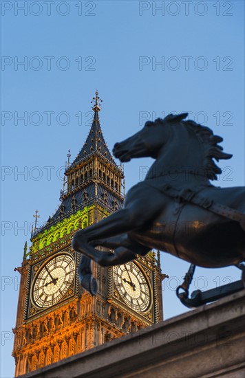 UK, England, London, Big Ben and Boadicea Statue at dusk.