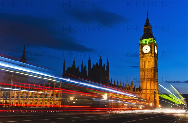 UK, England, London, Big Ben and light trails at night.