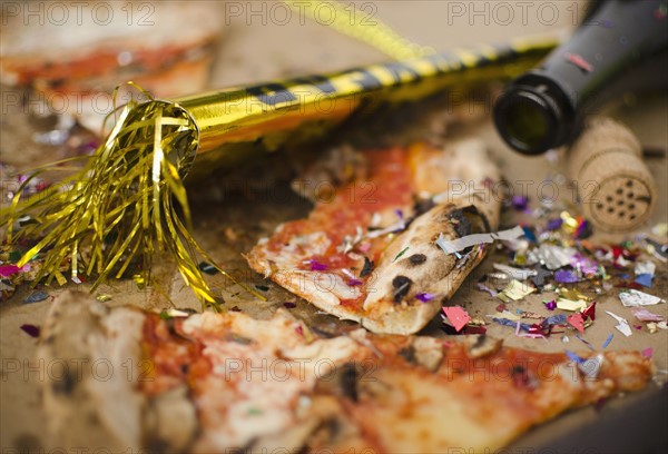 Slices of pizza and confetti in in box. 
Photo : Jamie Grill