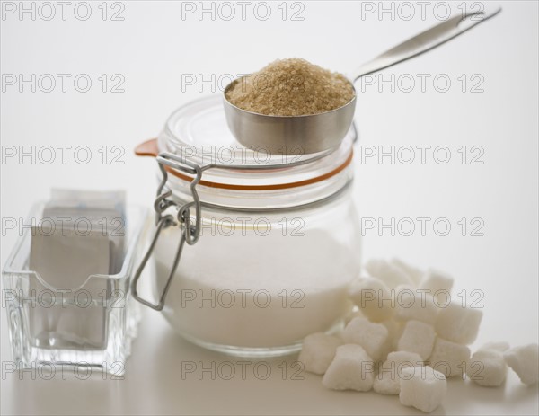 Still life with white sugar, brown sugar and sweetener. 
Photo : Jamie Grill