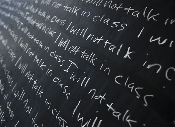 Blackboard with writing lines. 
Photo : Jamie Grill