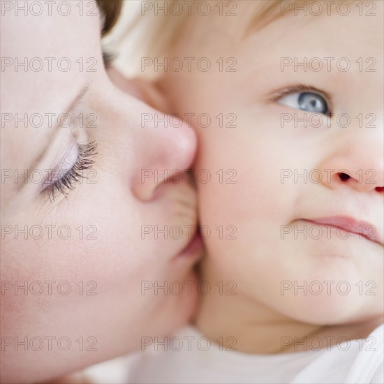 Mother kissing son (6-11 months). 
Photo: Jamie Grill