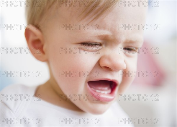 Baby boy (6-11 months) crying.
Photo : Jamie Grill