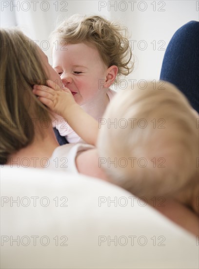 Mother and children (6-11 moths, 2-3). 
Photo : Jamie Grill