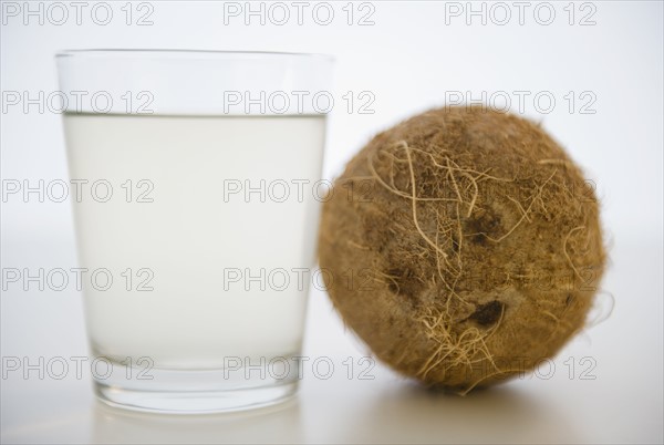 Coconut water in glass. 
Photo : Jamie Grill