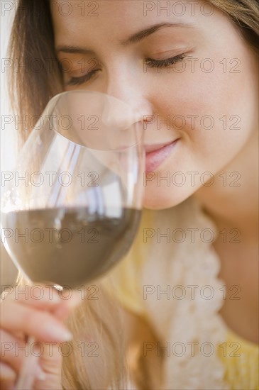 Woman smelling wine. 
Photo : Jamie Grill