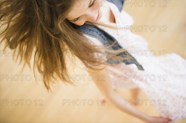 Woman dancing. 
Photo : Jamie Grill