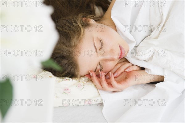 Woman sleeping in bed. 
Photo : Jamie Grill