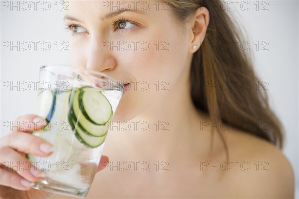 Woman drinking water. 
Photo : Jamie Grill