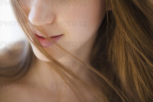 Lips and neck of beautiful woman. 
Photo: Jamie Grill