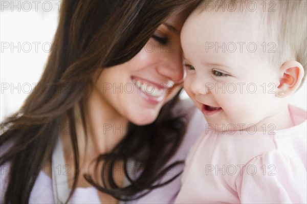 Mother with baby daughter (6-11 months) . 
Photo : Jamie Grill