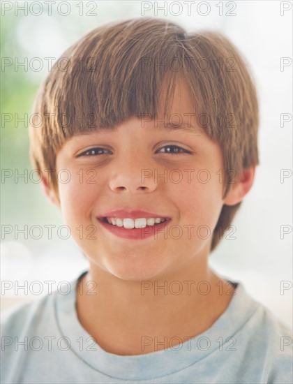 Portrait of smiling boy (10-11 years) . 
Photo: Daniel Grill