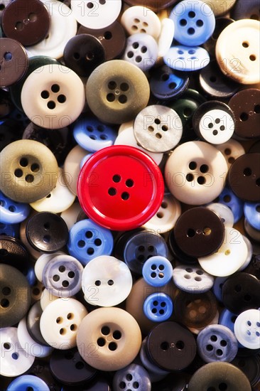 Close up of colorful buttons, studio shot. 
Photo: Daniel Grill