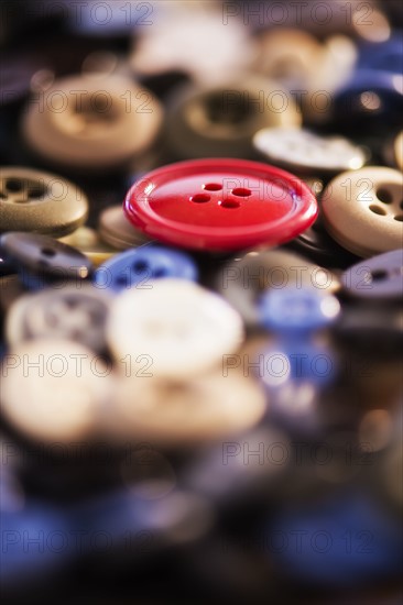 Close up of colorful buttons, studio shot. 
Photo: Daniel Grill