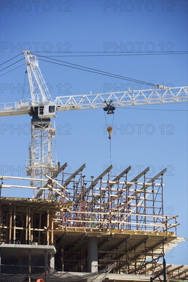 Crane on construction site. 
Photo : fotog