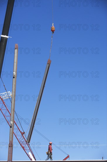 Construction worker on construction frame. 
Photo: fotog