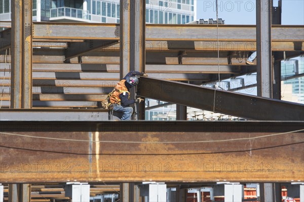 USA, New York, Long Island, New York City, Male worker on construction site. 
Photo: fotog