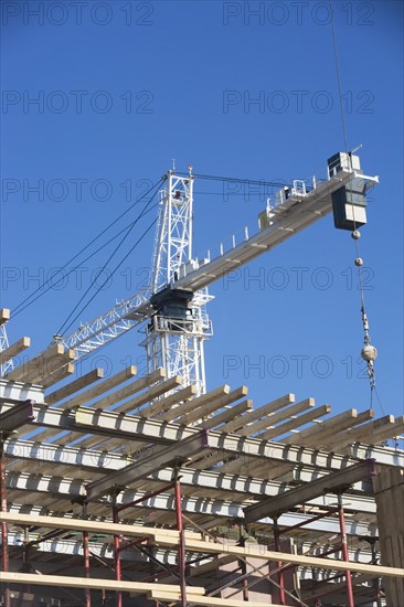 Crane on construction site. 
Photo : fotog