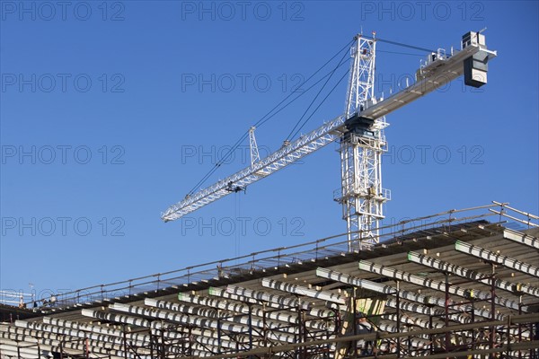 Crane on construction site. 
Photo : fotog