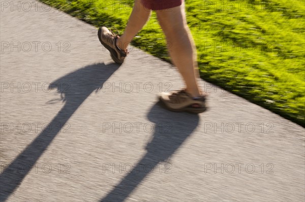 Older man walking. 
Photo : Kristin Lee