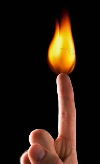 Index finger with flame. 
Photo : Mike Kemp