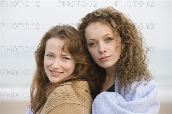 Two women on beach. 
Photo : Jan Scherders