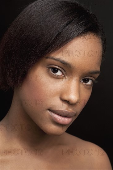 Beautiful young woman looking at camera. 
Photo : Jan Scherders