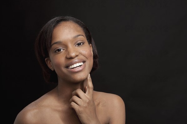 Beautiful young woman smiling and looking at camera. 
Photo: Jan Scherders