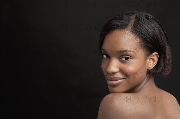 Beautiful young woman looking at camera. 
Photo: Jan Scherders