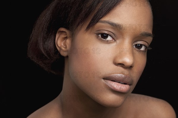 Beautiful young woman looking at camera. 
Photo: Jan Scherders