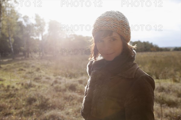 Netherlands, Utrechtse Heuvelrug, Portrait of young woman in winter countryside. 
Photo : Jan Scherders