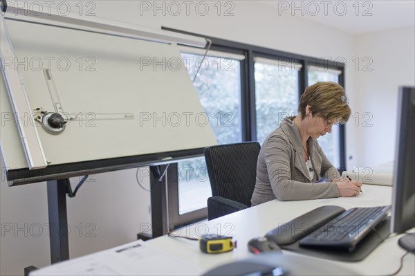 Employees of design agency at work. 
Photo : Jan Scherders