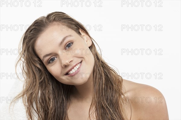 Portrait of young woman with wet hair. 
Photo: Jan Scherders