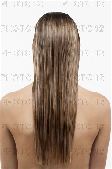 Blonde woman with long wet hair. 
Photo: Jan Scherders